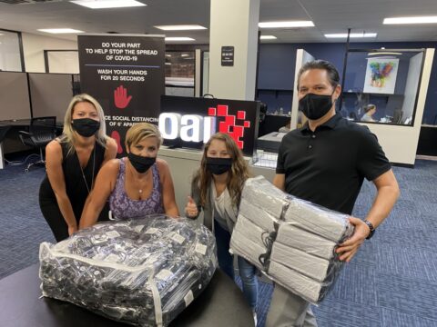 OAI Employees donating face masks